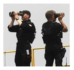 Men looking two ways with binoculars