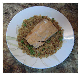 Grilled salmon filet on brown rice